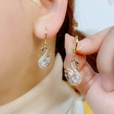 Boucles d'oreilles Cygnes blancs, bijou en alliage plaqué or 585 (14 ct) et en zircons naturels