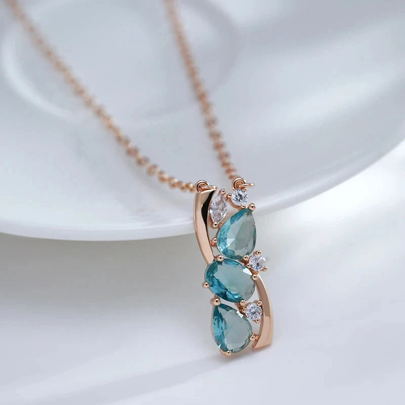 Collier de zircons bleu aquamarine et de zircons blancs, bijou en plaqué or rose