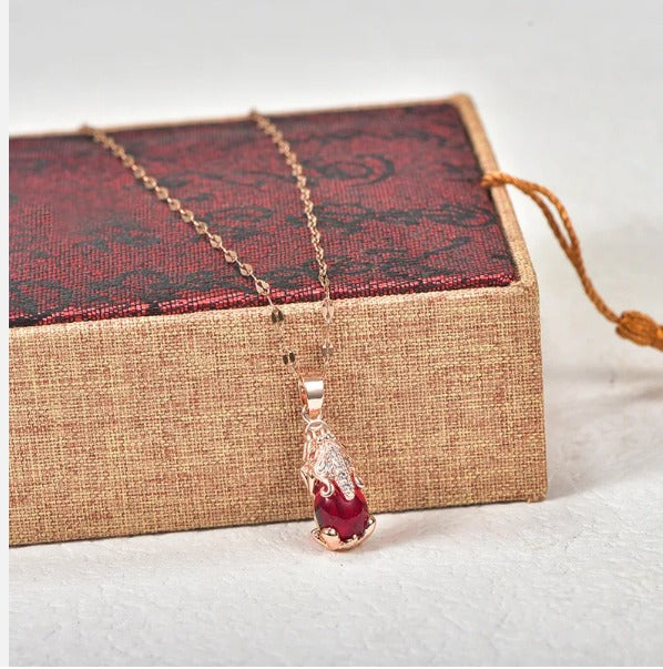 Collier éléphant avec pierre en agate rouge, bijou en acier inoxydable plaqué or rose