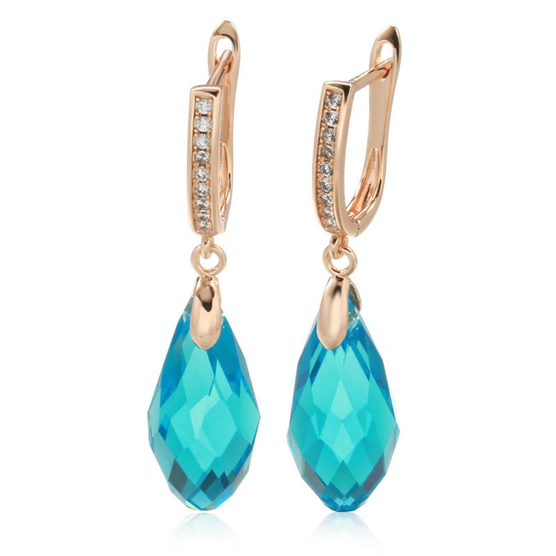 Boucles d'oreilles cristal bleu, bijou en plaqué or rose, en cristal et en zircons naturels