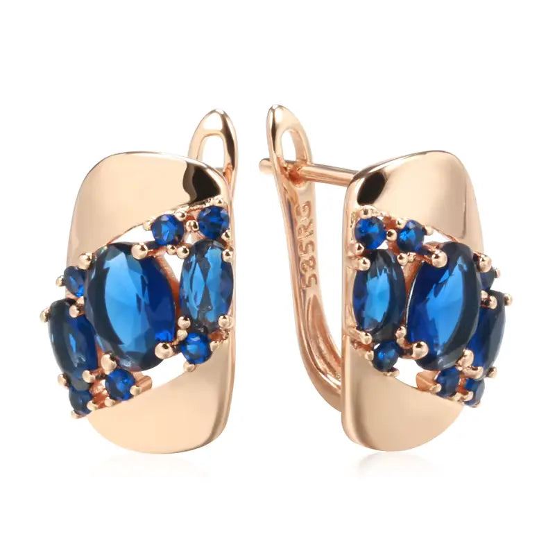 Boucles d'oreilles zircons bleu saphir, bijou en plaqué or rose 585 (14 carats) et en zircons naturels