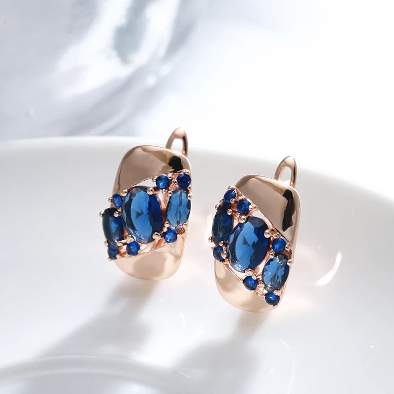 Boucles d'oreilles avec zircons bleu saphir, bijou en plaqué or rose