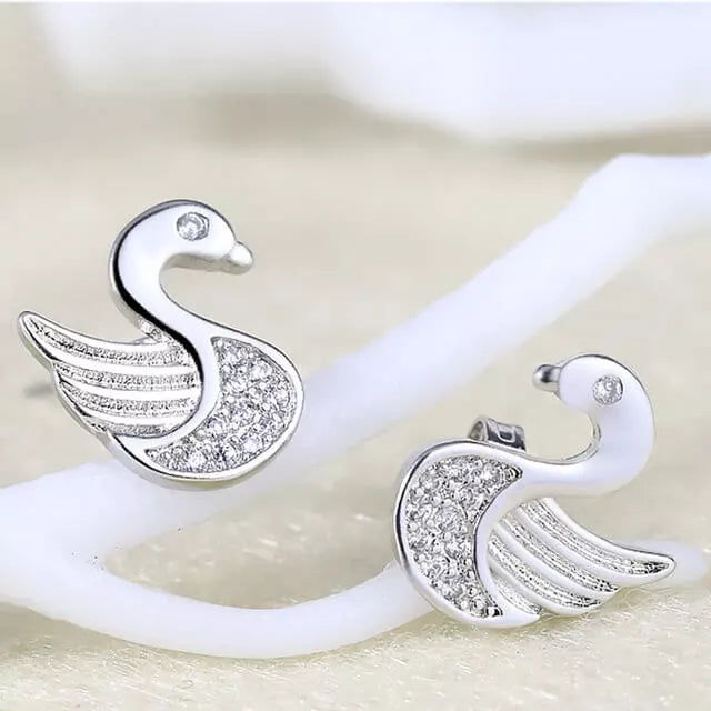 boucles d'oreilles cygnes avec zircons blancs