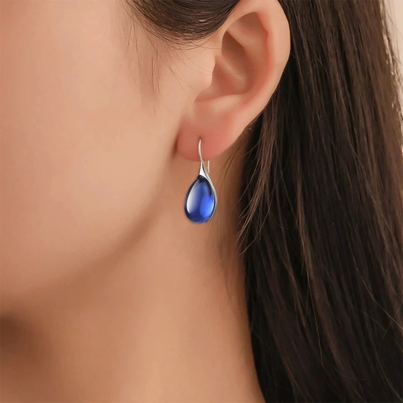 boucles d'oreilles avec opales bleues