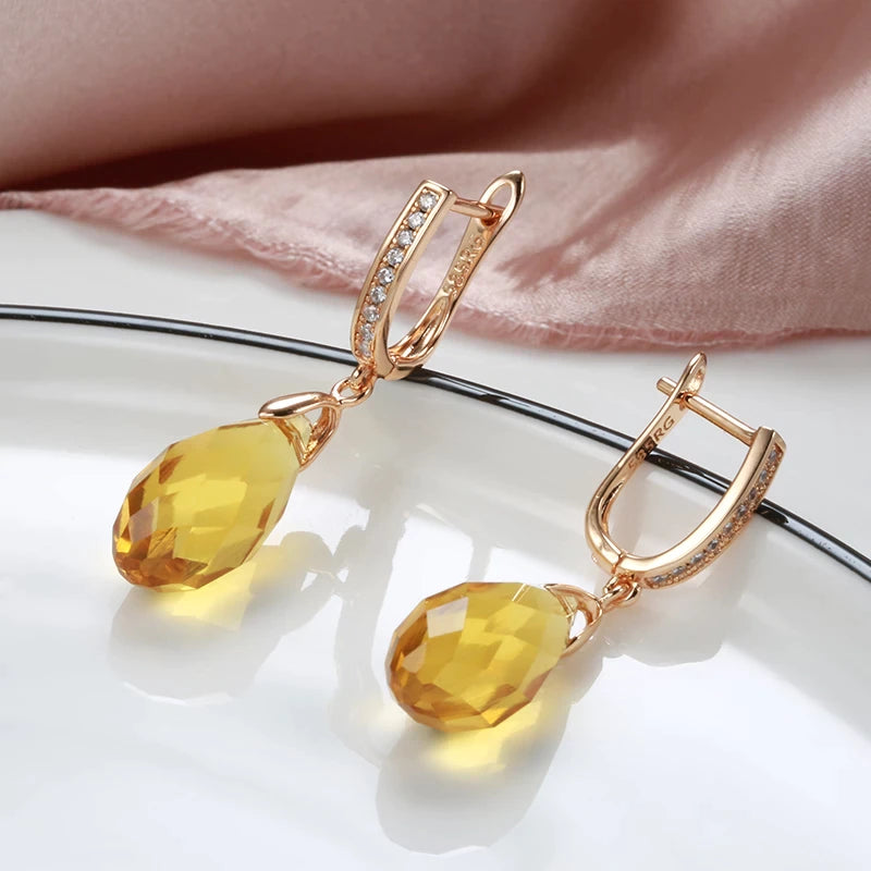 boucles d'oreilles avec cristal jaune et zircons blancs