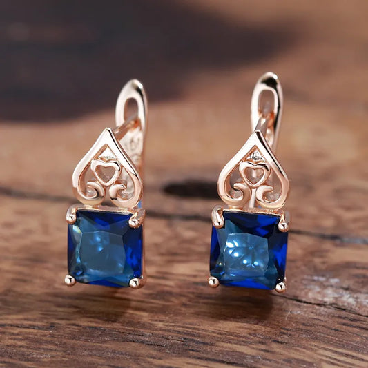 Boucles d'oreilles avec zircons bleu saphir et coeurs arabesques, bijou en plaqué or rose