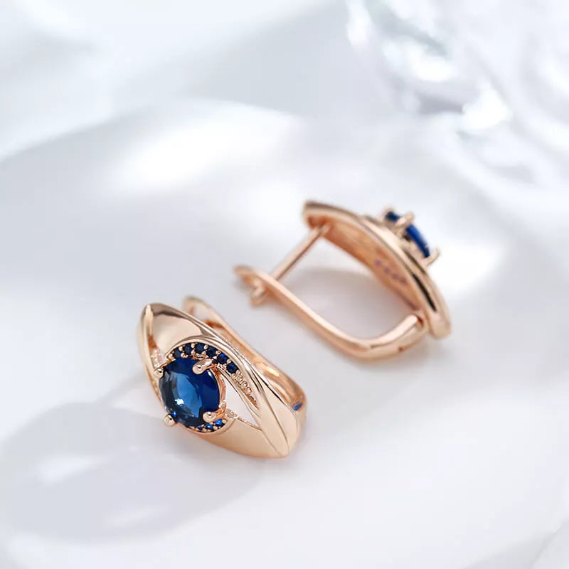 Boucles d'oreilles avec zircons bleu foncé, bijou en plaqué or rose