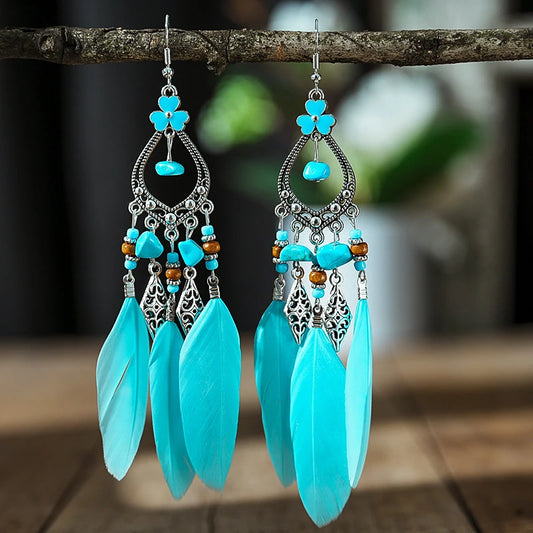 Boucles d'oreilles ethniques à perles et à plumes bleu clair