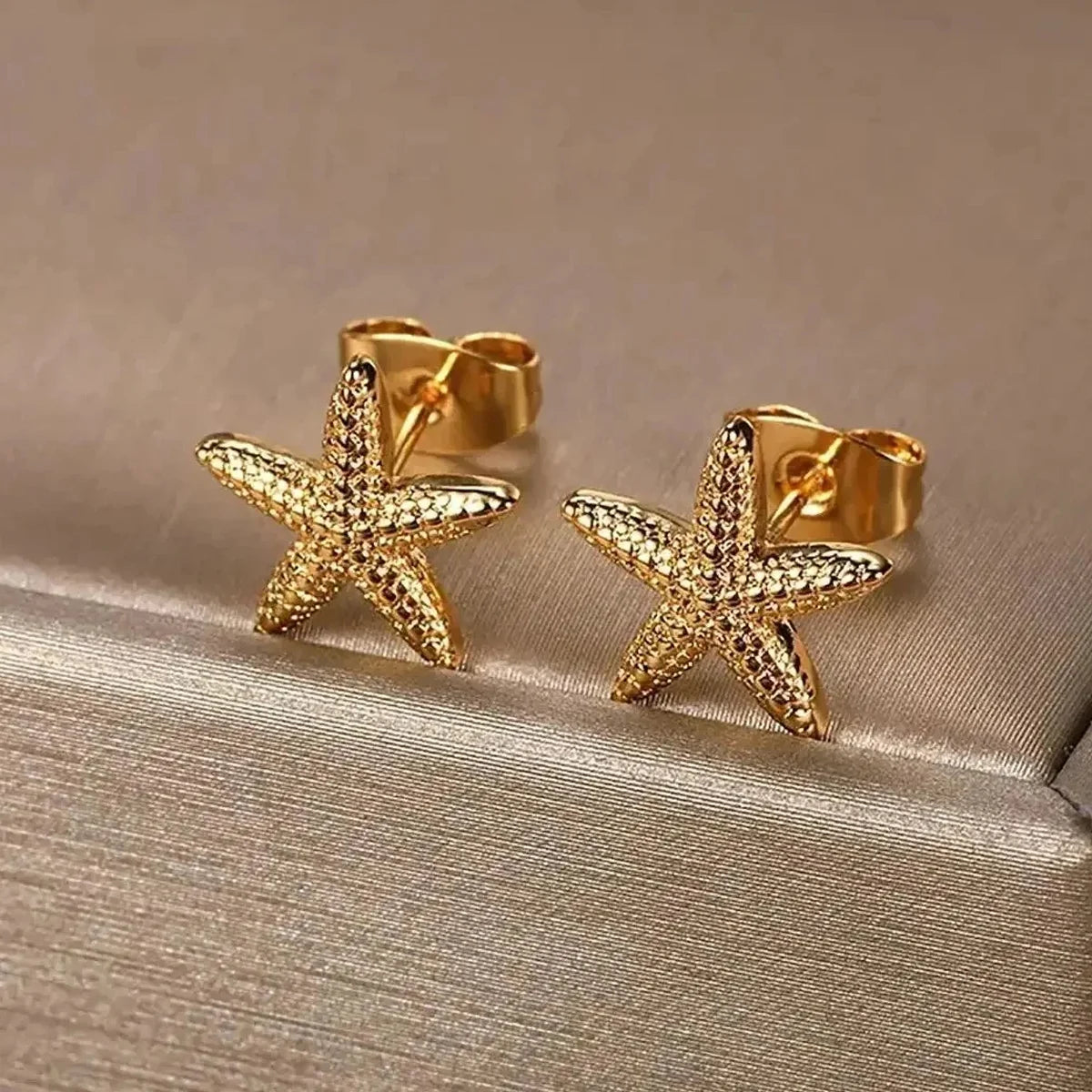 Boucles d'oreilles Etoiles de mer, bijou en acier inoxydable doré