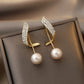 Boucles d'oreilles pendantes perles beige ivoire, bijou plaqué or et en acrylique