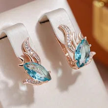 Boucles d'oreilles Poisson avec cristal bleu et zircons blancs, bijou en plaqué or rose