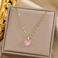 Collier Coeur en zircons roses, bijou en alliage plaqué or 585 (14 carats)