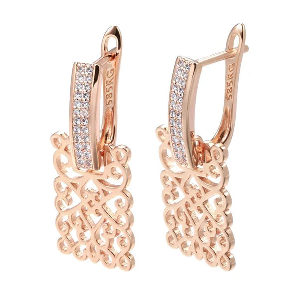 boucles d'oreilles avec arabesques et zircons blancs