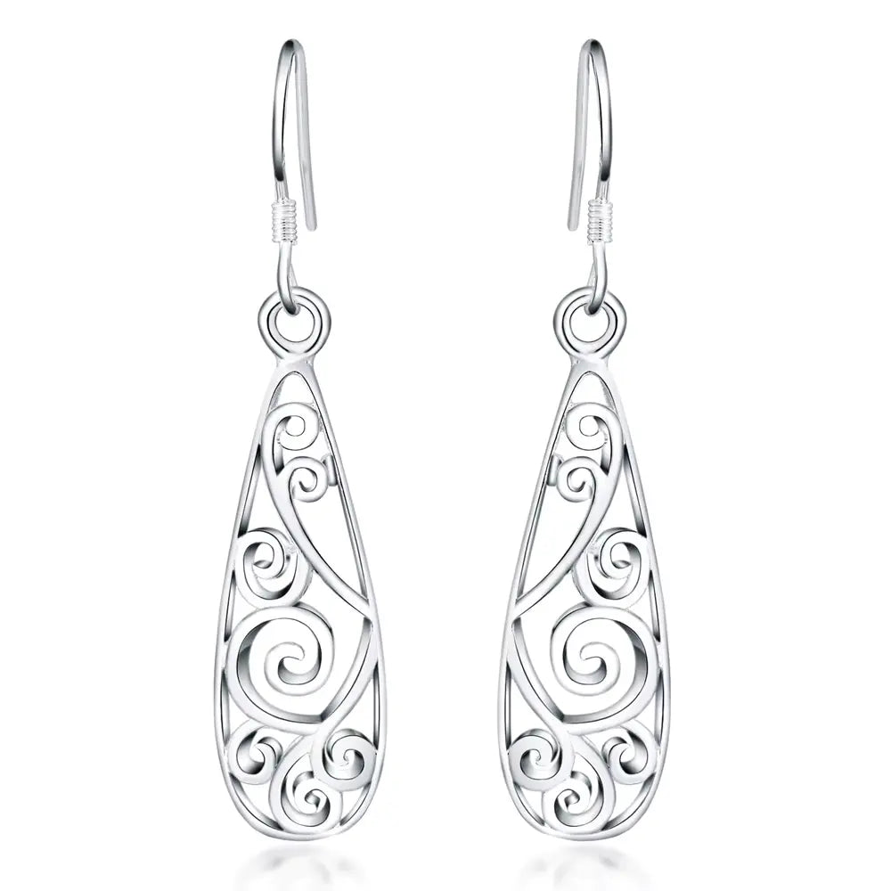 Boucles d'oreilles arabesques ajourées, bijou en plaqué argent