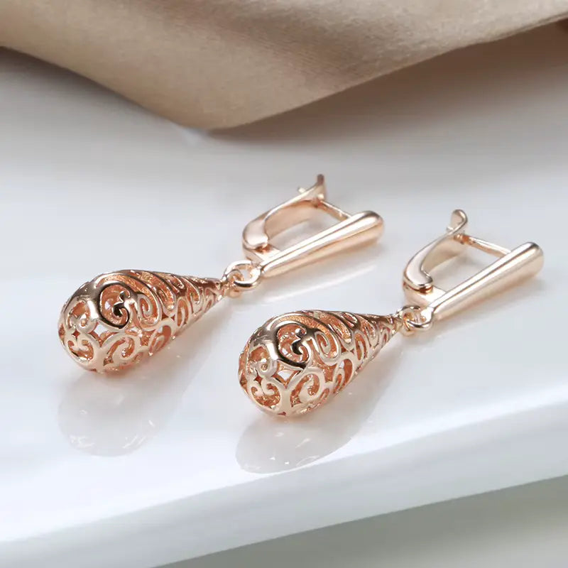 Boucles d'oreilles gouttes et arabesques ajourées, bijou en plaqué or rose 585 (14 carats)