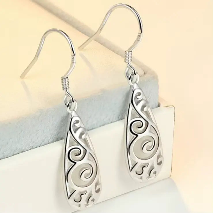 Boucles d'oreilles arabesques ajourées, bijou en plaqué argent