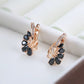 Boucles d'oreilles fleur noire, bijou en plaqué or rose et en zircons naturels