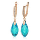 Boucles d'oreilles cristal bleu, bijou en plaqué or rose, en cristal et en zircons naturels