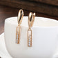 Boucles d'oreilles pendantes design rectangulaire, bijou en plaqué or rose 585 (14 carats) et en zircons naturels