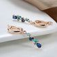 Boucles d'oreilles Zircons bleus, bijou en plaqué or rose et en zircons naturels