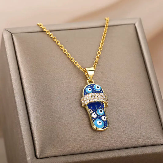 Collier sandale oeil turc, maille forçat, bijou en plaqué or, en émail et en zircons naturels