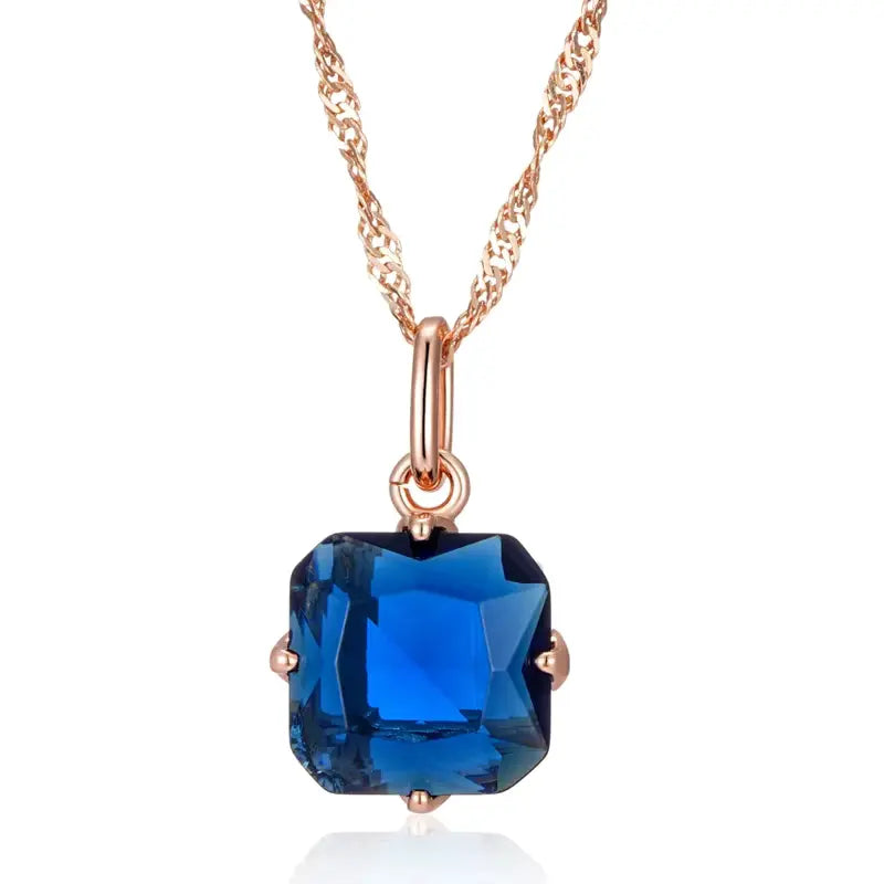 Collier pendentif pierre bleue, bijou en plaqué or rose 585 (14 carats) et en zircon naturel