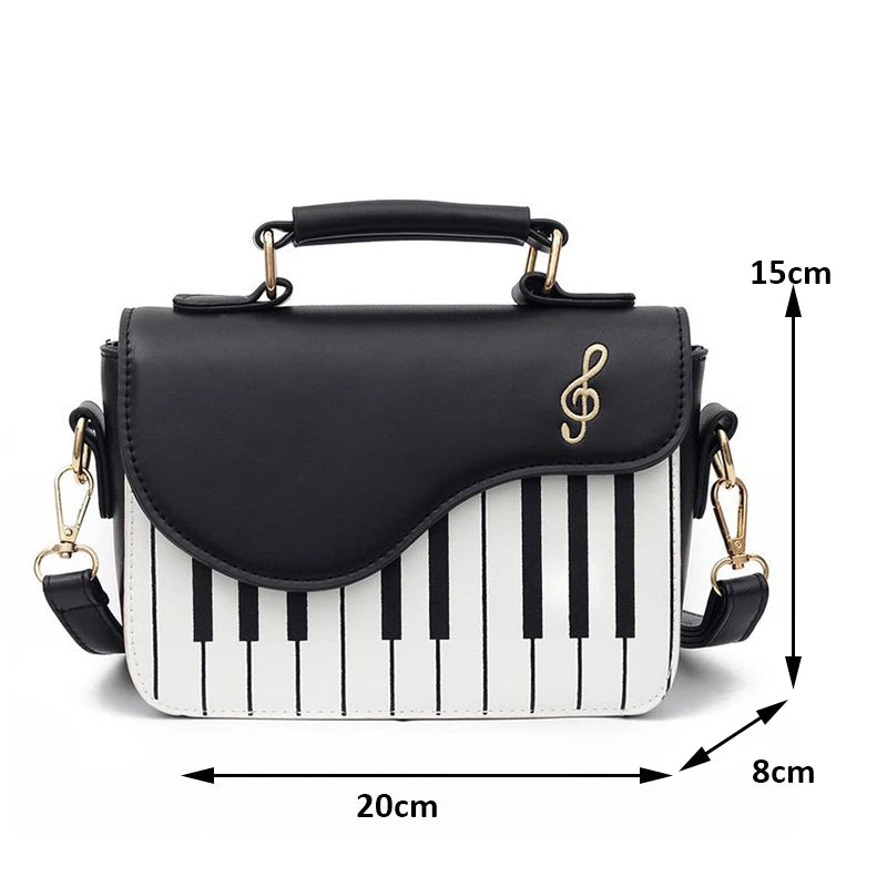 Sac à bandoulière design piano, noir et blanc, en simili-cuir