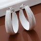 boucles d'oreilles anneaux modernes