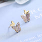 boucles d'oreilles papillons avec zircons mauves
