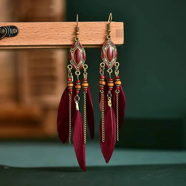 boucles d'oreilles à plumes rouges