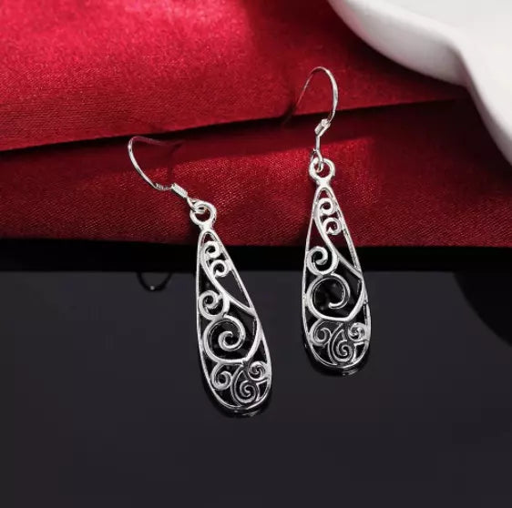 boucles d'oreilles exotiques avec motif paisley