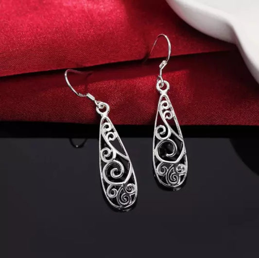 boucles d'oreilles exotiques avec motif paisley