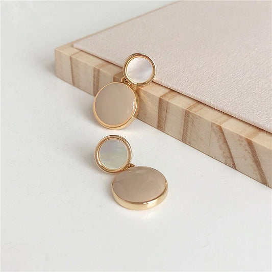 boucles d'oreilles géométriques en émail beige