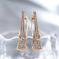 Boucles d'oreilles Pavés de zircons & courbes élégantes, bijou en plaqué or 585 (14 carats) et en zircons naturels