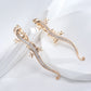 boucles d'oreilles lézards zircons blancs
