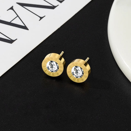 boucles d'oreilles avec chiffres romains et zircons blancs