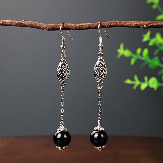 Boucles d'oreilles pendantes Perles "oeil de chat" noires, bijou en acier inoxydable