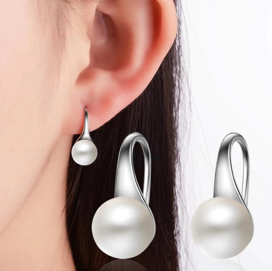 boucles d'oreilles avec perles beiges