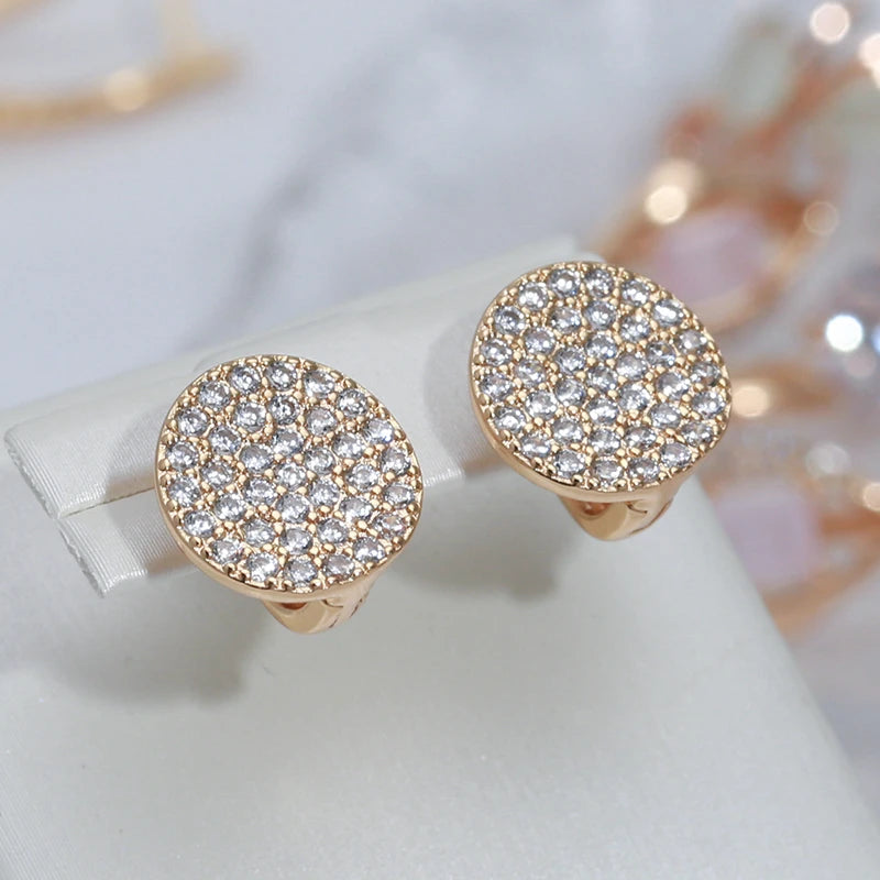 Boucles d'oreilles montantes serties de zircons plaqué or rose