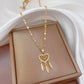 Collier Attrape-rêves avec zircons, bijou en acier inoxydable doré