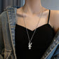 collier avec pendentif lapin serti de zircons